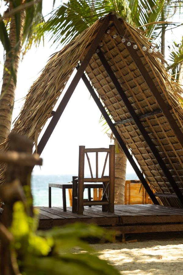 Amami Beach Resort Пуэрто-Галера Экстерьер фото