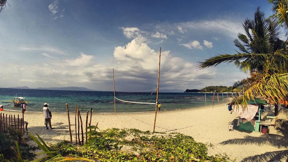 Amami Beach Resort Пуэрто-Галера Экстерьер фото