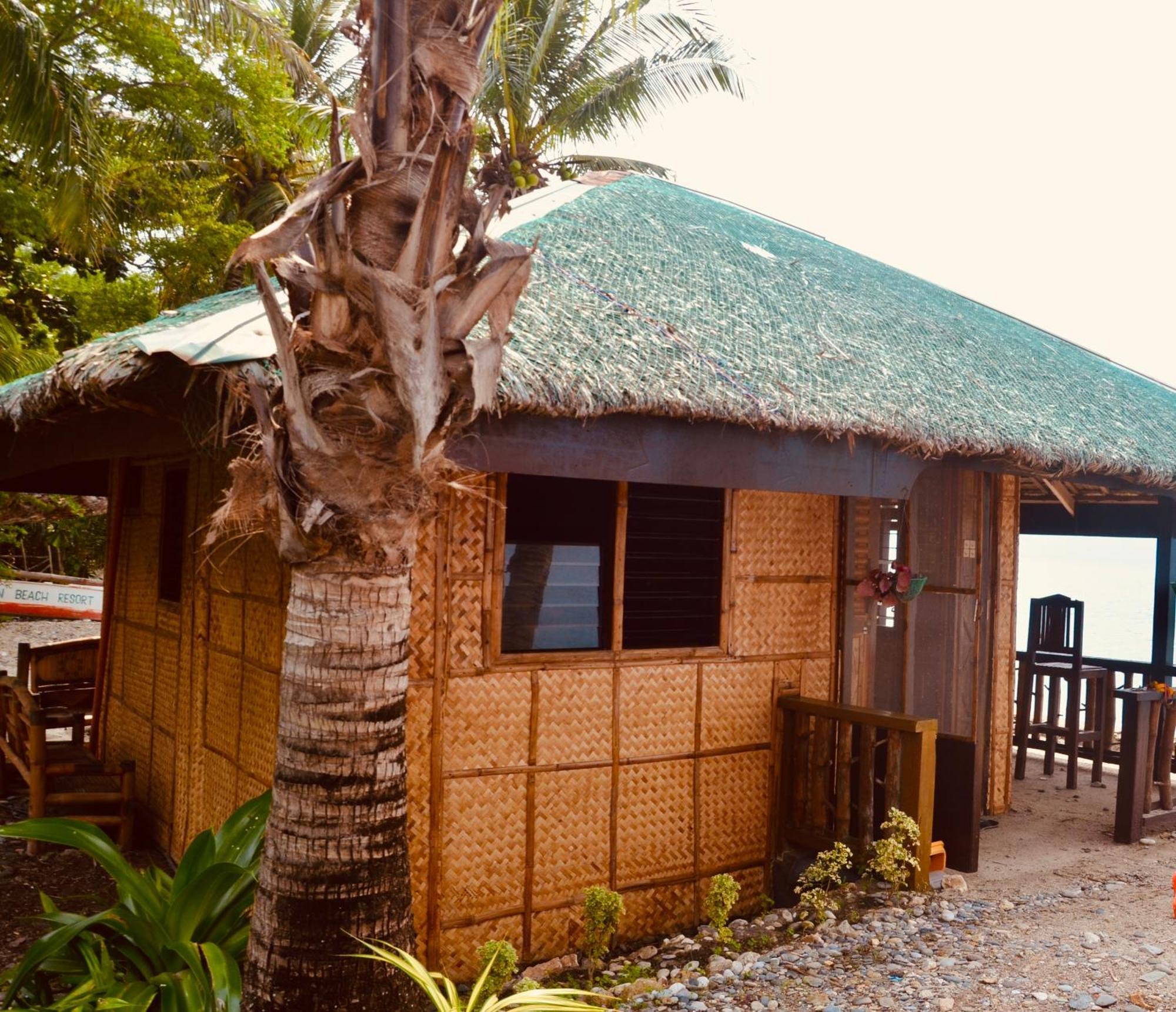 Amami Beach Resort Пуэрто-Галера Экстерьер фото